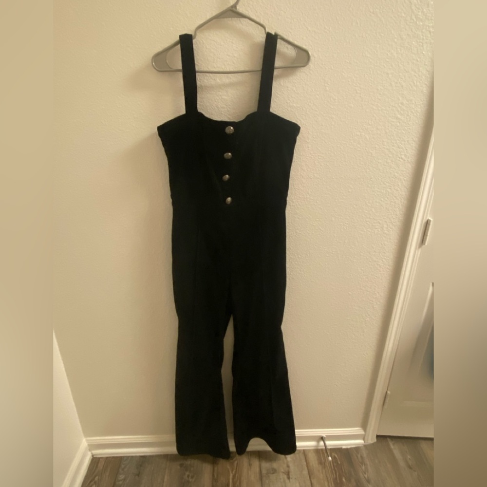 Black corduroy jumpsuit.